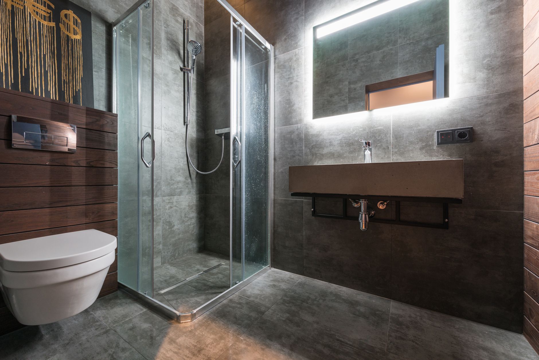 Sleek modern bathroom featuring a glass shower and elegant fixtures in Riverside, CA