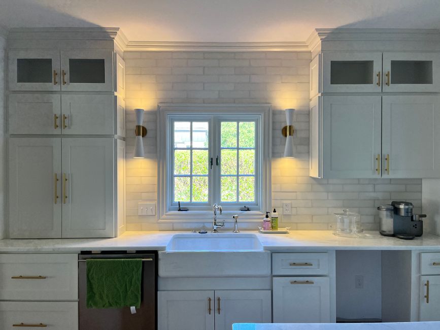 Bright home interior with white cabinets and natural light