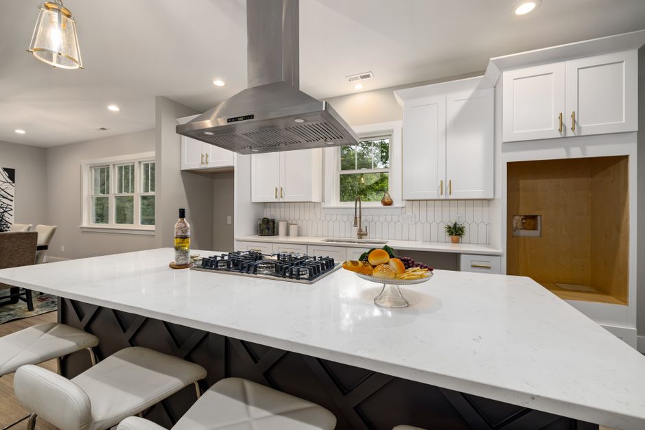 Home interior with light walls, cabinets and a window